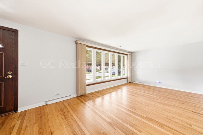 Building Photo - 5144 S Melvina Ave