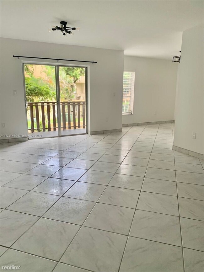 Foto del edificio - 2 br, 1 bath Condo - 4855 NW 7th St Apt 208