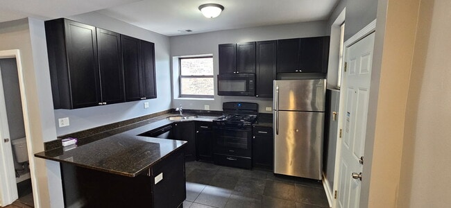 Building Photo - 6846 S Cornell Ave