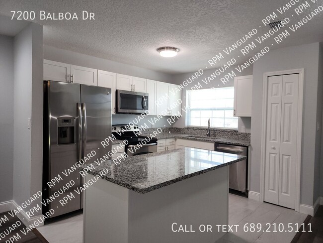 Building Photo - 7200 Balboa Dr