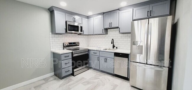Foto del edificio - 3216 E Roosevelt Ave