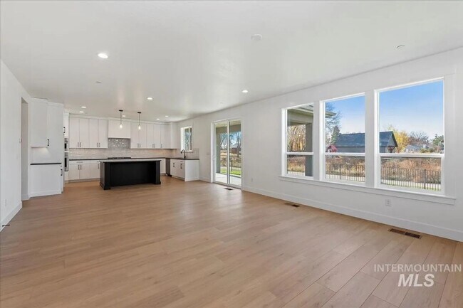 Building Photo - Spacious 4 Bed Home w/ Vaulted Ceilings, Office & Open Layout in Middleton