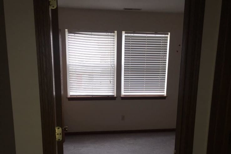 hallway looking into bedroom - 7060 Shore Ln