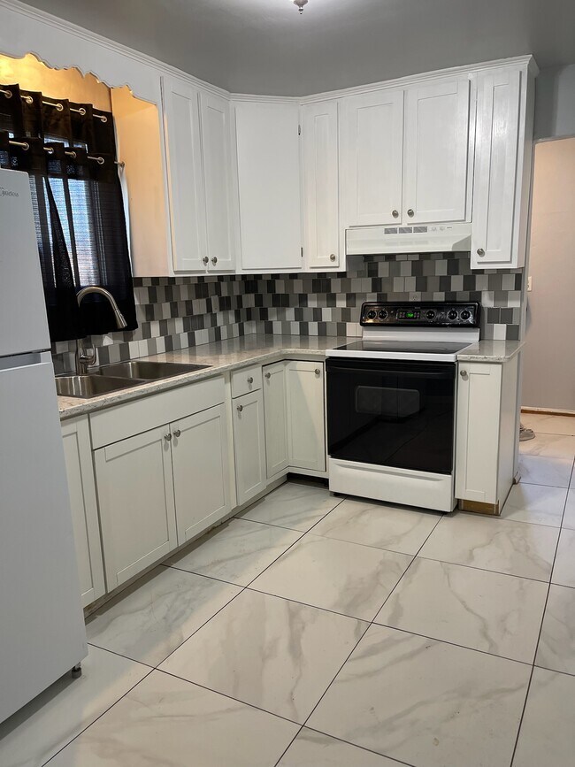 Kitchen: Stove View - 35 Royal St