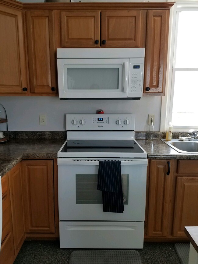 Kitchen, New appliances and cabinetry as of 2018. - 216 East St.