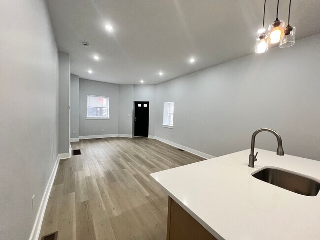 Building Photo - Renovated 4bd/2 bath House with Rear yard!! SECTION 8 ONLY!!