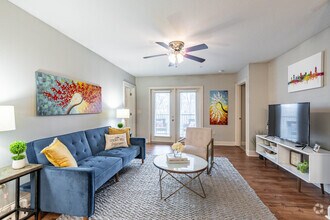 3BR, 2BA - 1581SF - Living Room - The Grand Reserve at Spring Hill
