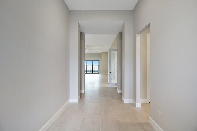Building Photo - Luxury 3/ 3.5 Plus Home Office Pool Home A...