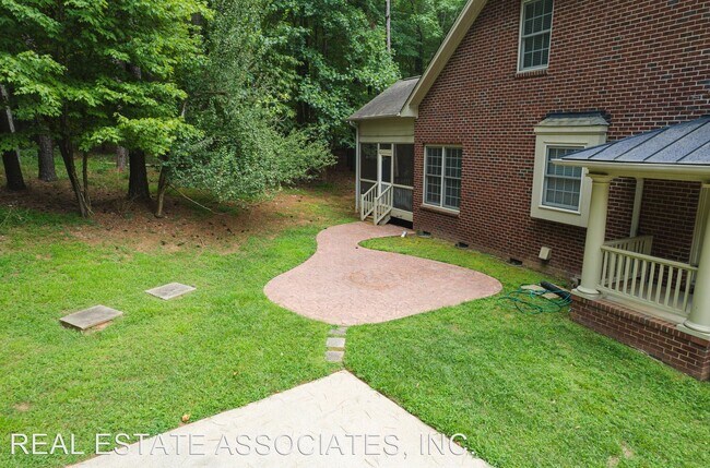 Building Photo - 4 br, 4.5 bath House - 7600 Rhone Court
