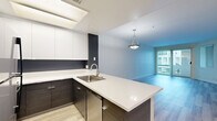 Located at 600 S Curson Ave in the heart of Los Angeles, this modern 2-bedroom, 3-bathroom residence offers a thoughtfully designed single-floor layout with contemporary finishes throughout. Light-toned laminate flooring flows seamlessly across the living spaces, enhancing the bright, airy ambiance created by abundant natural light streaming through large windows and sliding glass doors.

The open-concept kitchen is a standout feature, showcasing sleek white cabinetry, a dark contrasting backsplash, a white quartz peninsula with an undermount sink, and a full suite of stainless steel appliances including a refrigerator, electric range, and microwave. The kitchen opens directly to the living room, which connects to a private balcony through sliding glass doors—ideal for enjoying the Los Angeles climate.

Both bedrooms are well-proportioned and filled with natural light, with the primary bedroom offering generous closet space. Three well-appointed bathrooms include dark wood-toned vanities with white countertops and a clean tub-shower combination. Three closets throughout the residence provide ample storage. The overall aesthetic is clean, modern, and move-in ready, making this a highly functional and stylish home in a prime LA location.