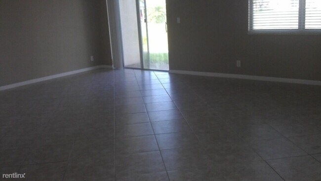Foto del edificio - 4 br, 2.5 bath Condo - 16122 Poppyseed Cir...