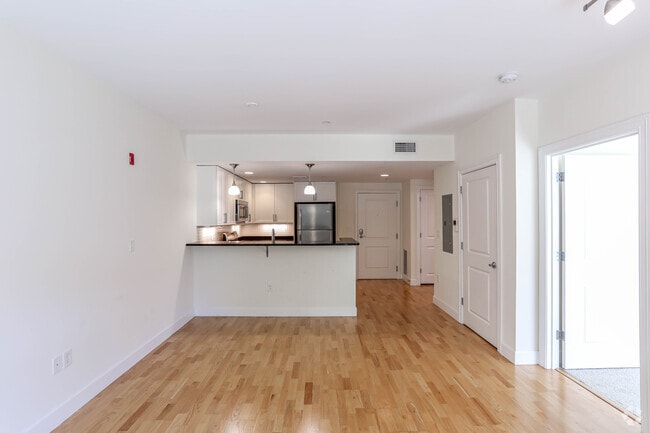 1HAB, 1BA - 740SF - Sala de estar y cocina - 7 Cameron Apartments
