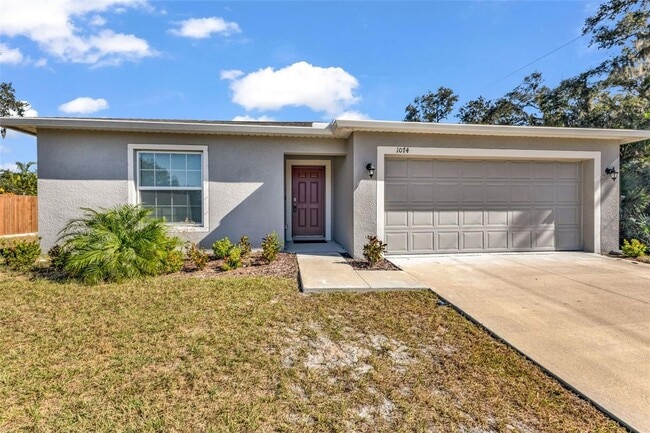 Building Photo - 3/2 FL dream home w/ large backyard & stylish new construction feel!!