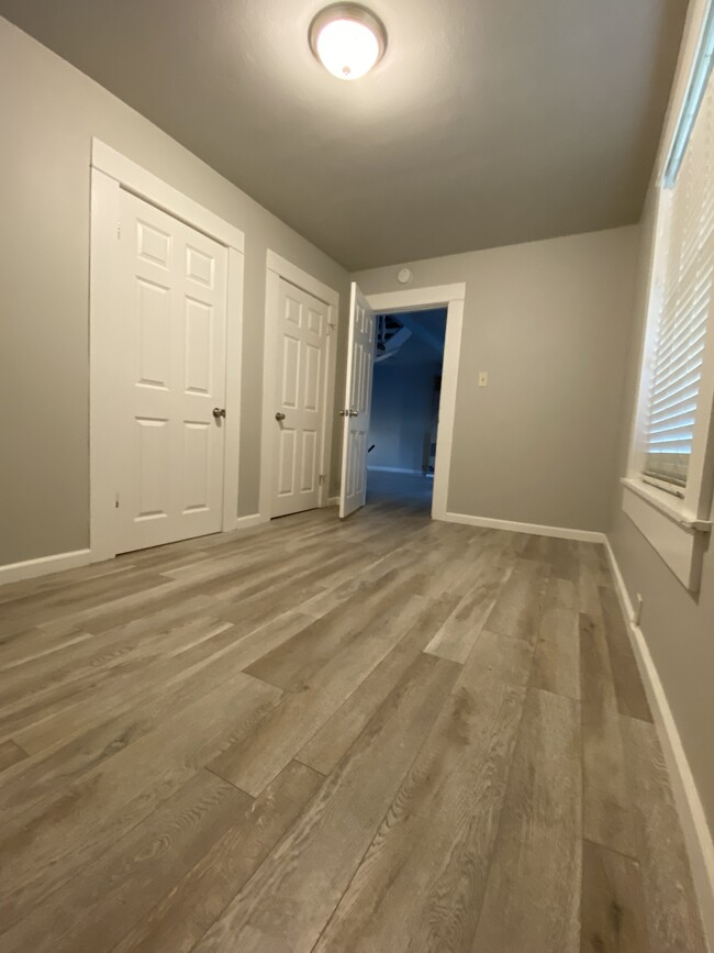 downstairs front bedroom looking toward living room - 221 Jefferson St