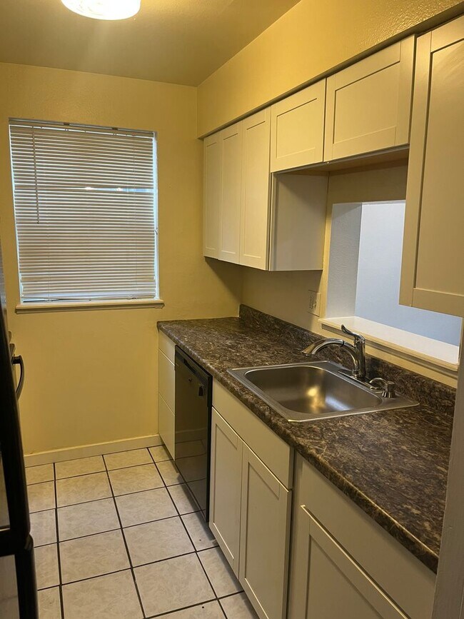 Building Photo - Spacious 1BR Condo - Available Soon