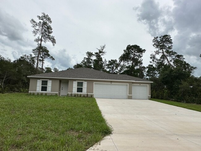 Building Photo - Elegant Home with three car garage