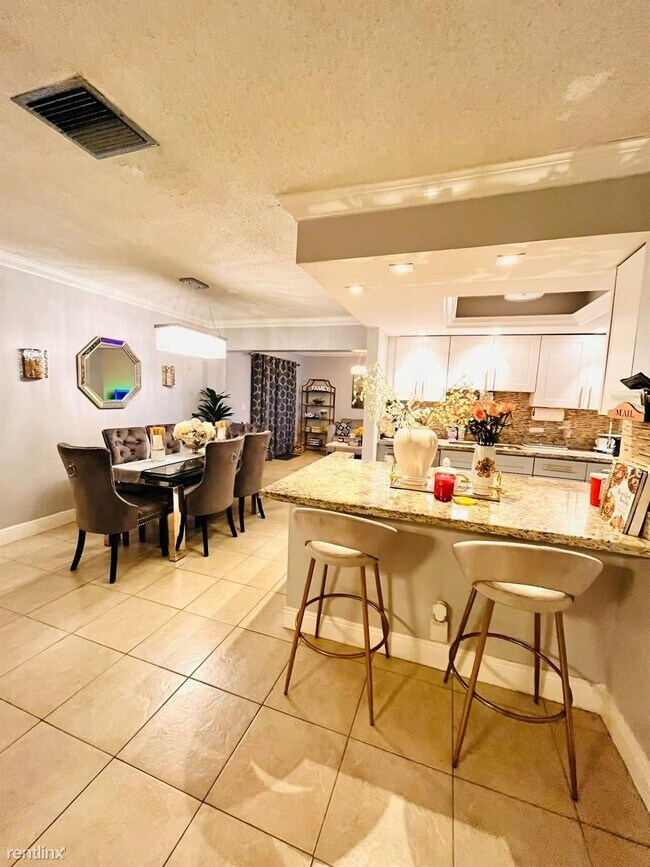 Foto del edificio - 3 br, 2 bath House - 5907 NW 74th Ave