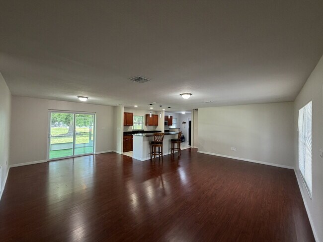 Building Photo - "Charming 3-Bedroom Home with Gleaming Hardwood Floors!"