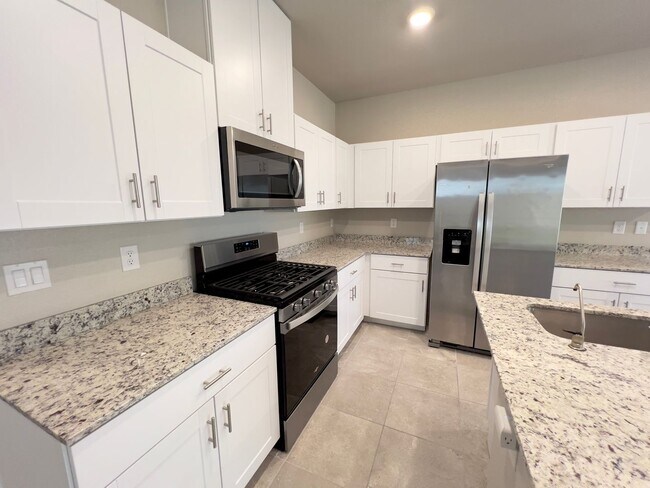 Building Photo - 4 bedroom, 2.5 bathroom home located in North West, Las Vegas