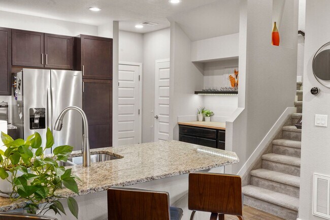 Building Photo - Modern 3-Bedroom Townhome in Midtown Denver – Carefree Living Awaits!