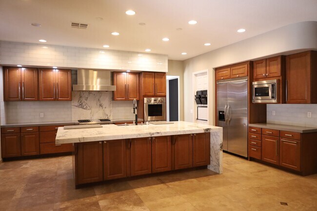 Building Photo - Fully Upgraded 5 Bedroom 4.5 Bathroom in Guard Gated Foothills Community!