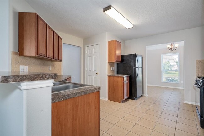 Building Photo - 9820 Hyacinth Way