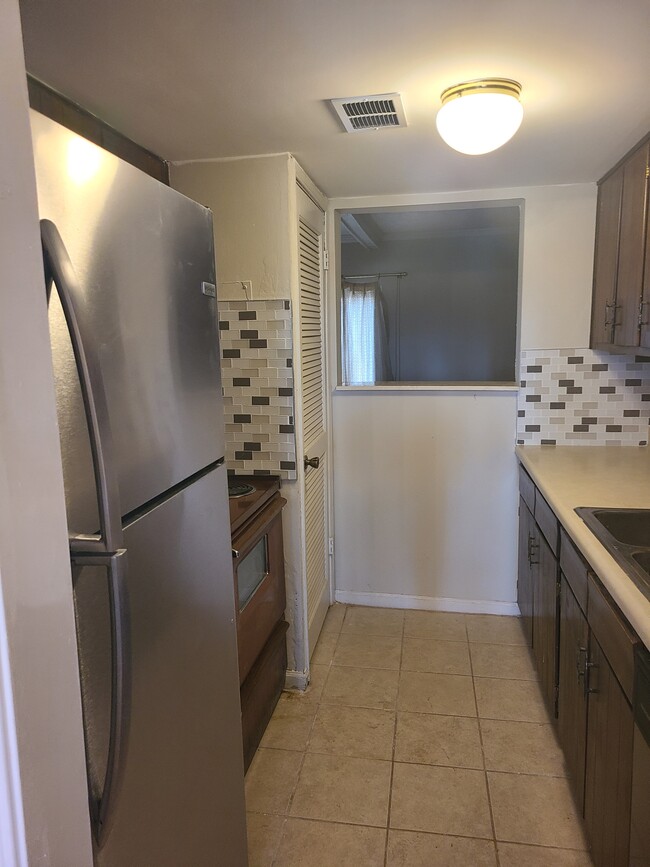 Kitchen: Stove and Fridge - 1394 Wood Cir S