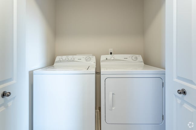 3 BR, 2.5 BA - 1458 SF - Laundry Closet - Blue Heron Pointe