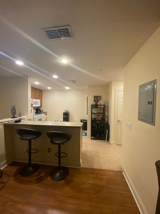 Dining room, hightop counter & kitchen - 2892 Lincroft Ave