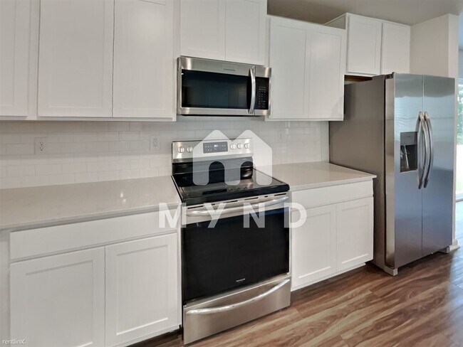 Building Photo - 4 br, 2 bath House - 5101 Cameron Commons ...