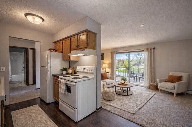 Cocina y sala de estar decoradas - Northumberland Apartments