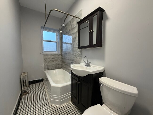 Building Photo - 6950 N Ashland Blvd