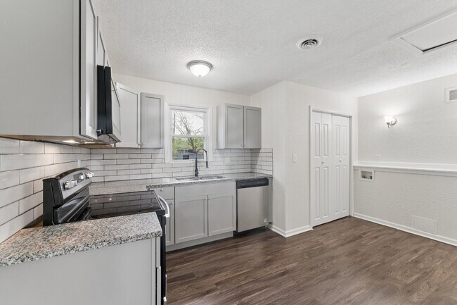 Building Photo - Fully Renovated 2BR/2BA + Bonus Room – Quiet Living with Spacious Backyard!  1st Month is FREE!
