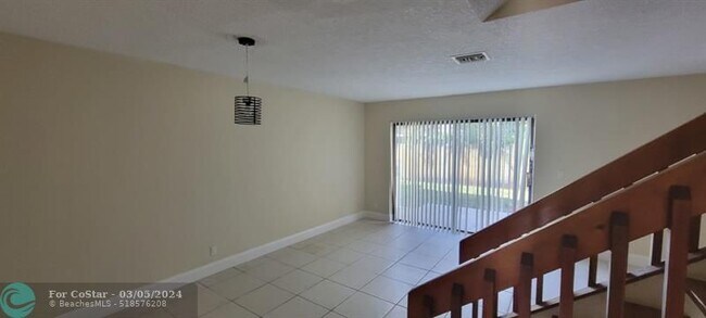 Building Photo - 11417 Royal Palm Blvd