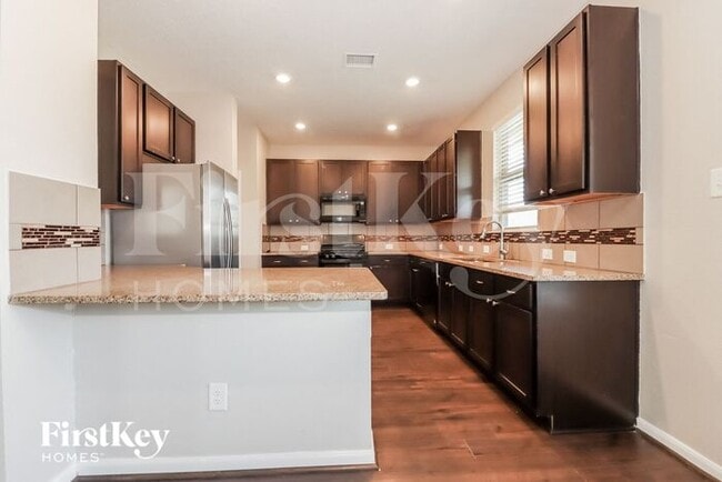 Foto del edificio - 5214 Pine Forest Ridge St
