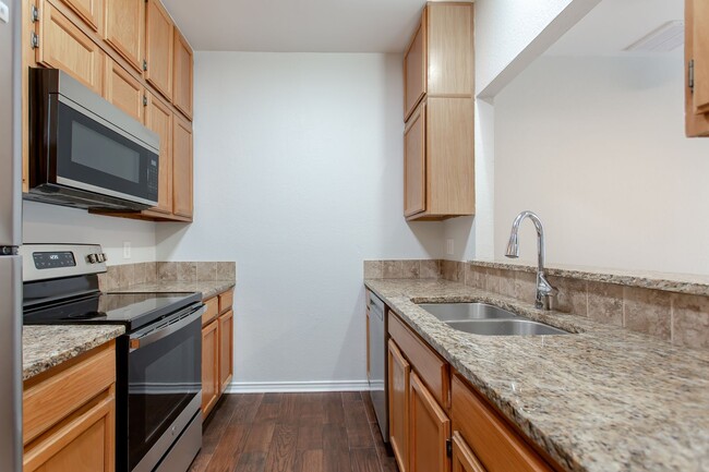 Building Photo - 2-Story Junius Heights Condo With Updates