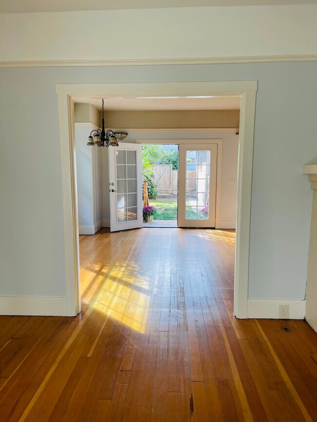 Living room into dining area and back yard - 2005 23rd Ave W