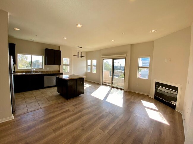 living room with Balcony - 5827 Carlton Way