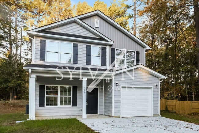 This lovely 4 bedroom, 3 bathroom home is ... photo'