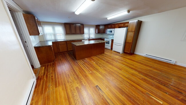 230-F Living Room and Kitchen - 230 W McMillan St (Cincinnati, OH) Apartments