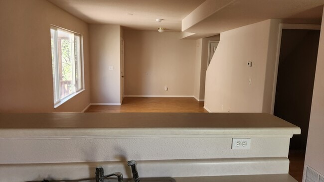 Kitchen into living room - 7944 Antelope Valley Pt