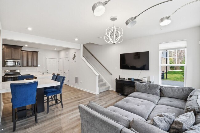 Photo - Step into a beautifully designed contemporary residence that exudes style and comfort at every turn. Apartment