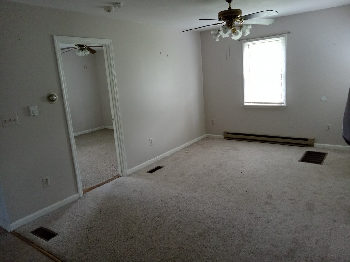 living, bed in background - 5306 Woodbine Rd
