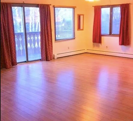 Living room to east deck - 4710 Mills Dr