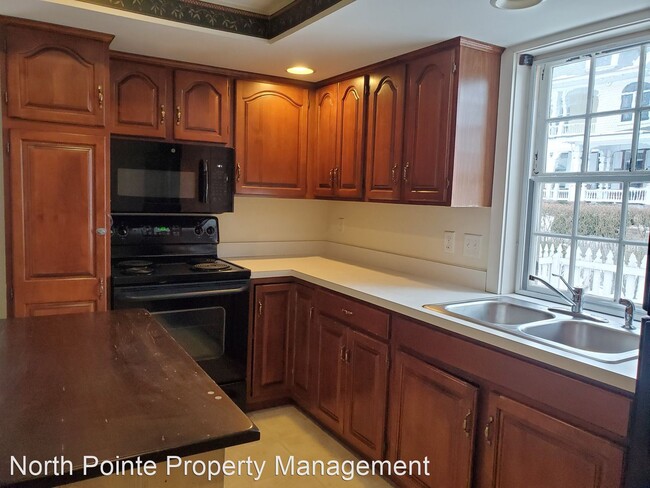 Building Photo - 4 br, 1.5 bath House - 124 W. Main St.