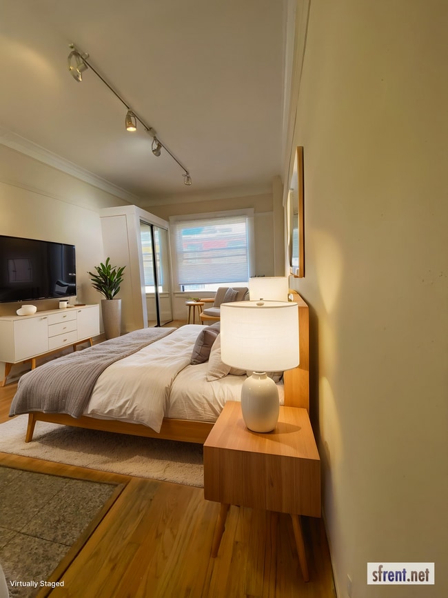 Photo - Raymond Investments LLC. Apartments