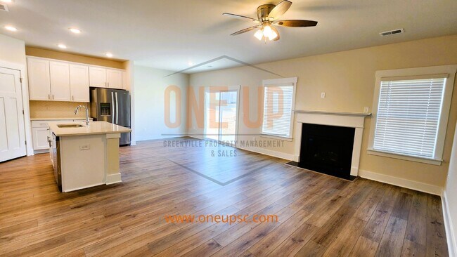 Building Photo - "Spacious 5-Bedroom Home with Fireplace in...