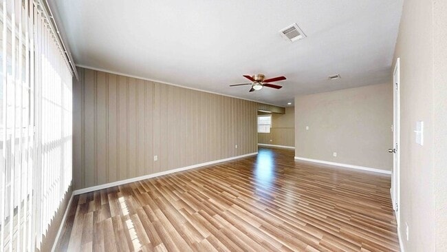 Building Photo - 3 bed 2 bath home with a carport in backyard