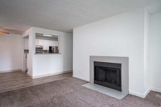 Riverwood Heights | Living Room with Fireplace - Riverwood Heights Apartments