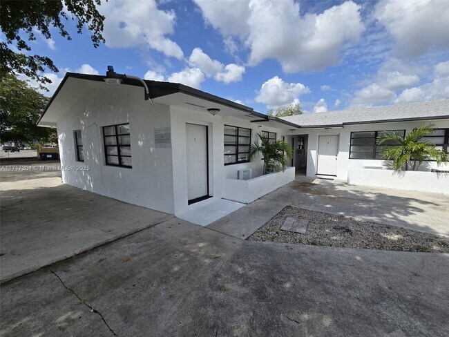 Building Photo - 7090 NW 17th Ave